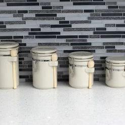 Outlet ❤️ Home Basics 4 Piece Ceramic Canisters with Easy Open Air-Tight Clamp Top Lid and Wooden Spoons, Beige 😉 -Home Basics Sales 208df55d6c3a4363b46324196a945392 d3d6cca4 f1a3 48b5 80a9 59adf55c126d 1080x