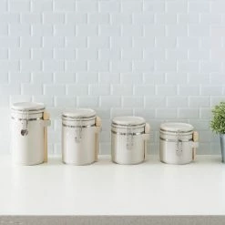 Outlet ❤️ Home Basics 4 Piece Ceramic Canisters with Easy Open Air-Tight Clamp Top Lid and Wooden Spoons, Beige 😉 -Home Basics Sales bb6271690f414aaf9ae680bfe0277a7e b65c7da4 be81 4994 b09c dfaa31427997 1080x